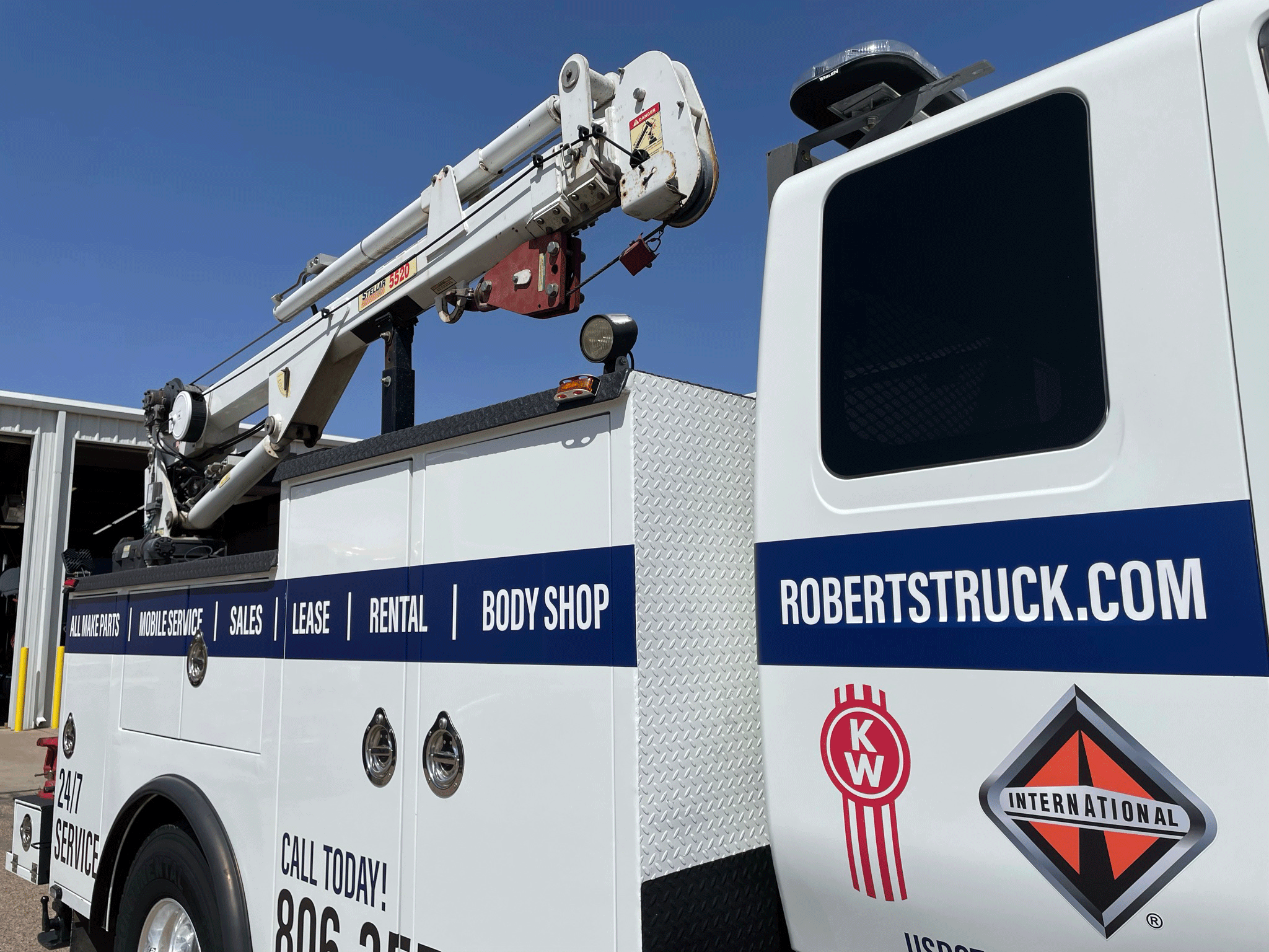 Our service truck body with a service crane mounted to the body.