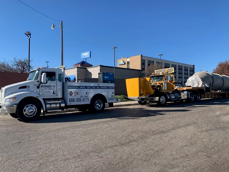 Our mobile service truck working on a customer's truck outside of a hotel.